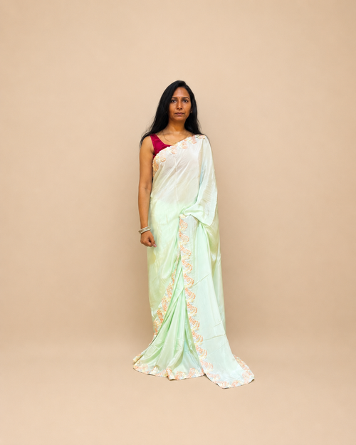 Pastel Green Crepe Saree with Floral Lace Border
