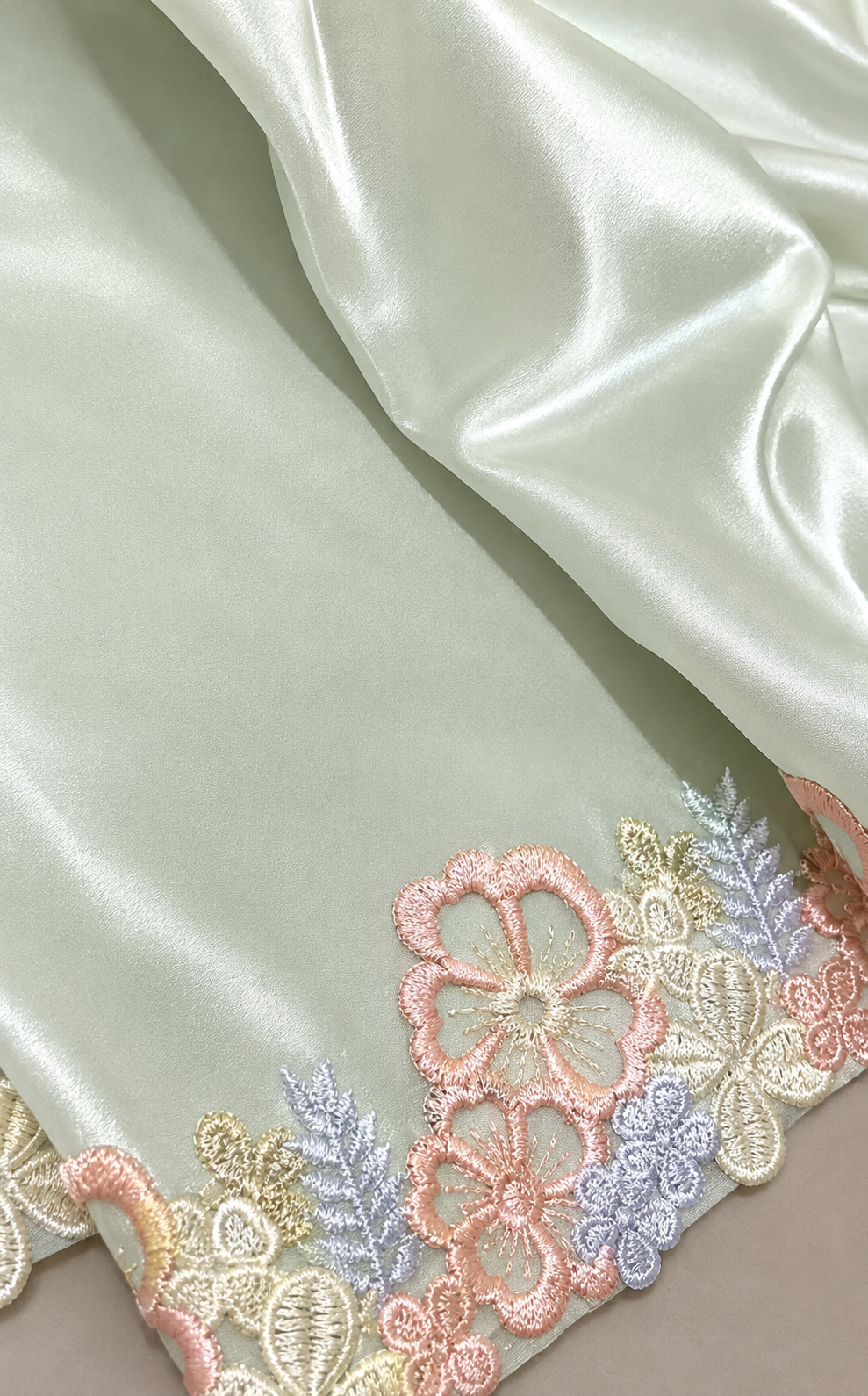 Pastel Green Crepe Saree with Floral Lace Border