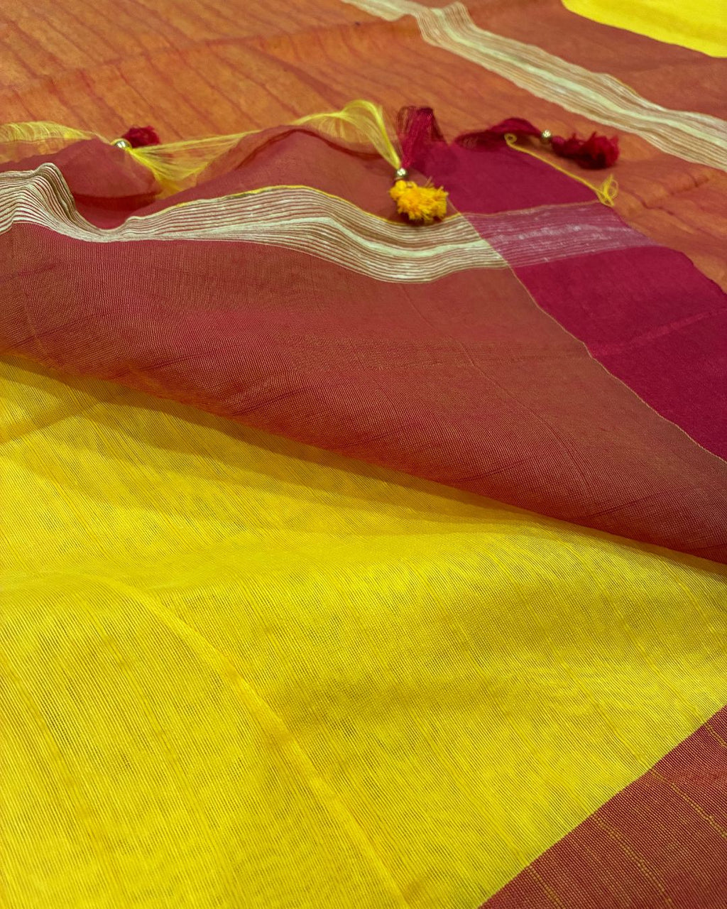 Golden Yellow Dola Saree with Red Pallu & Tassels