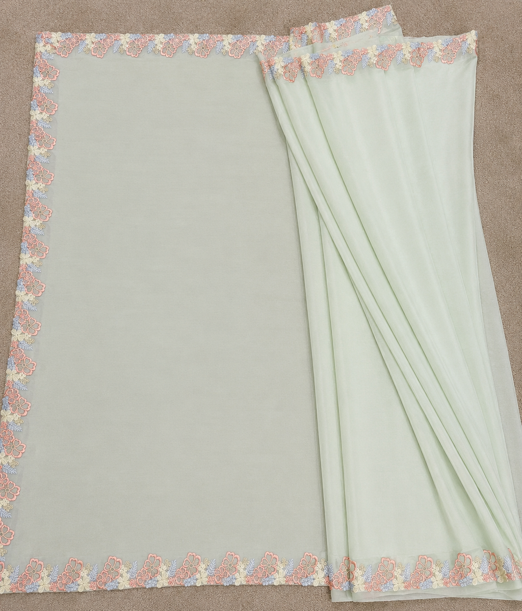 Pastel Green Crepe Saree with Floral Lace Border