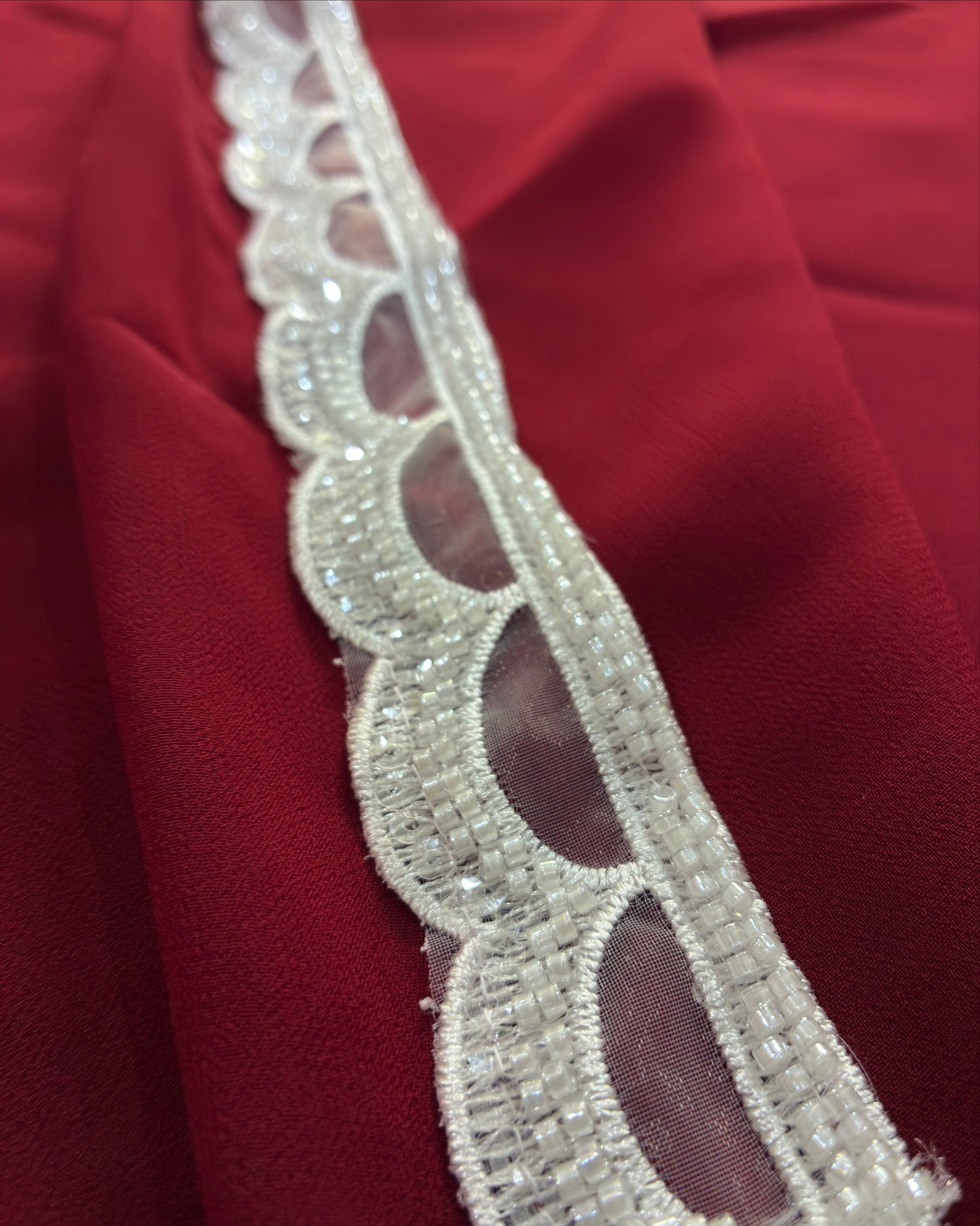 Maroon Gorgette Saree with white Pearl Border