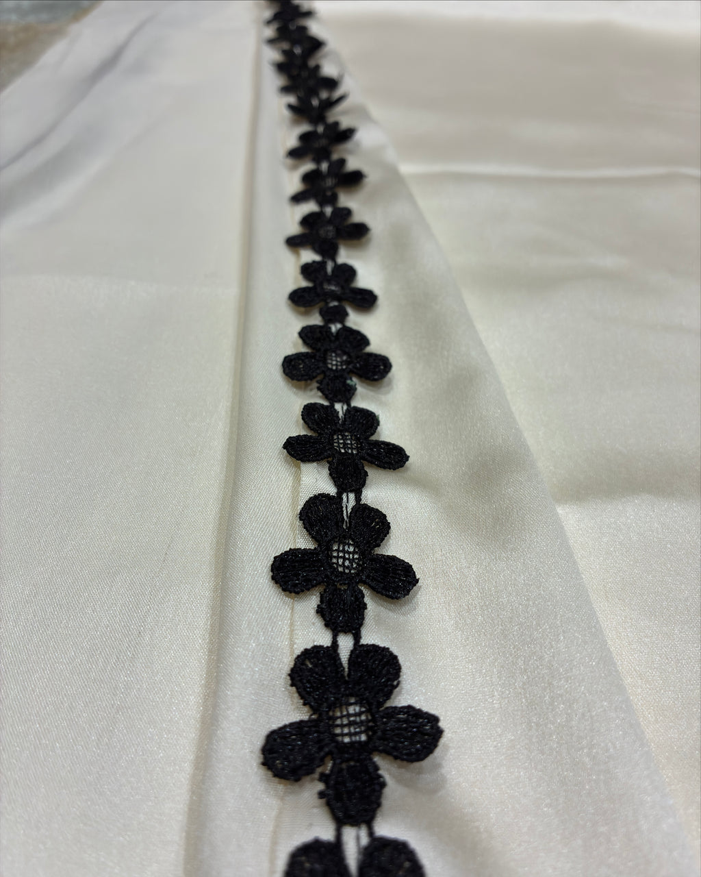 Ivory Satin Saree with Black Flower Lace