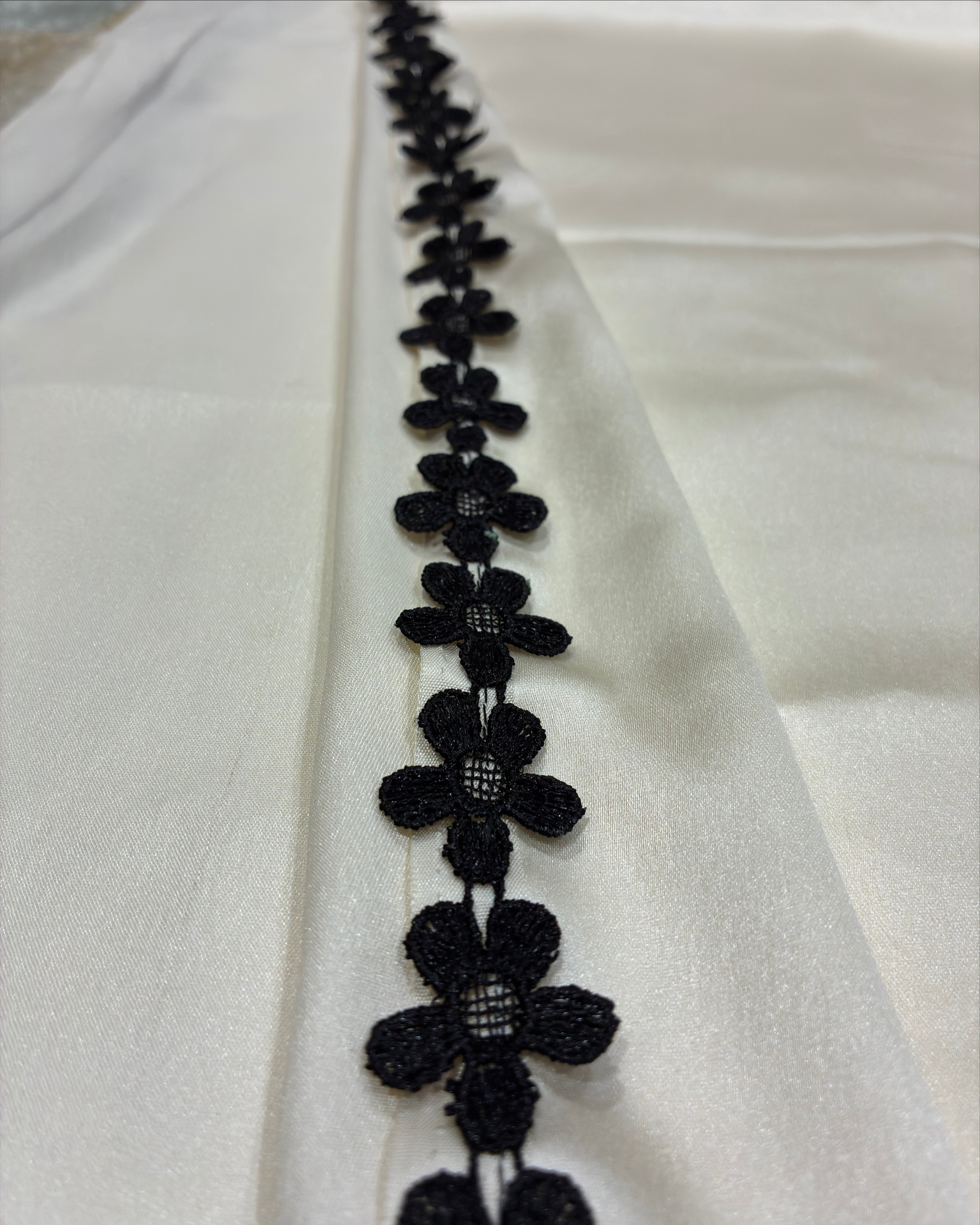Ivory Satin Saree with Black Flower Lace