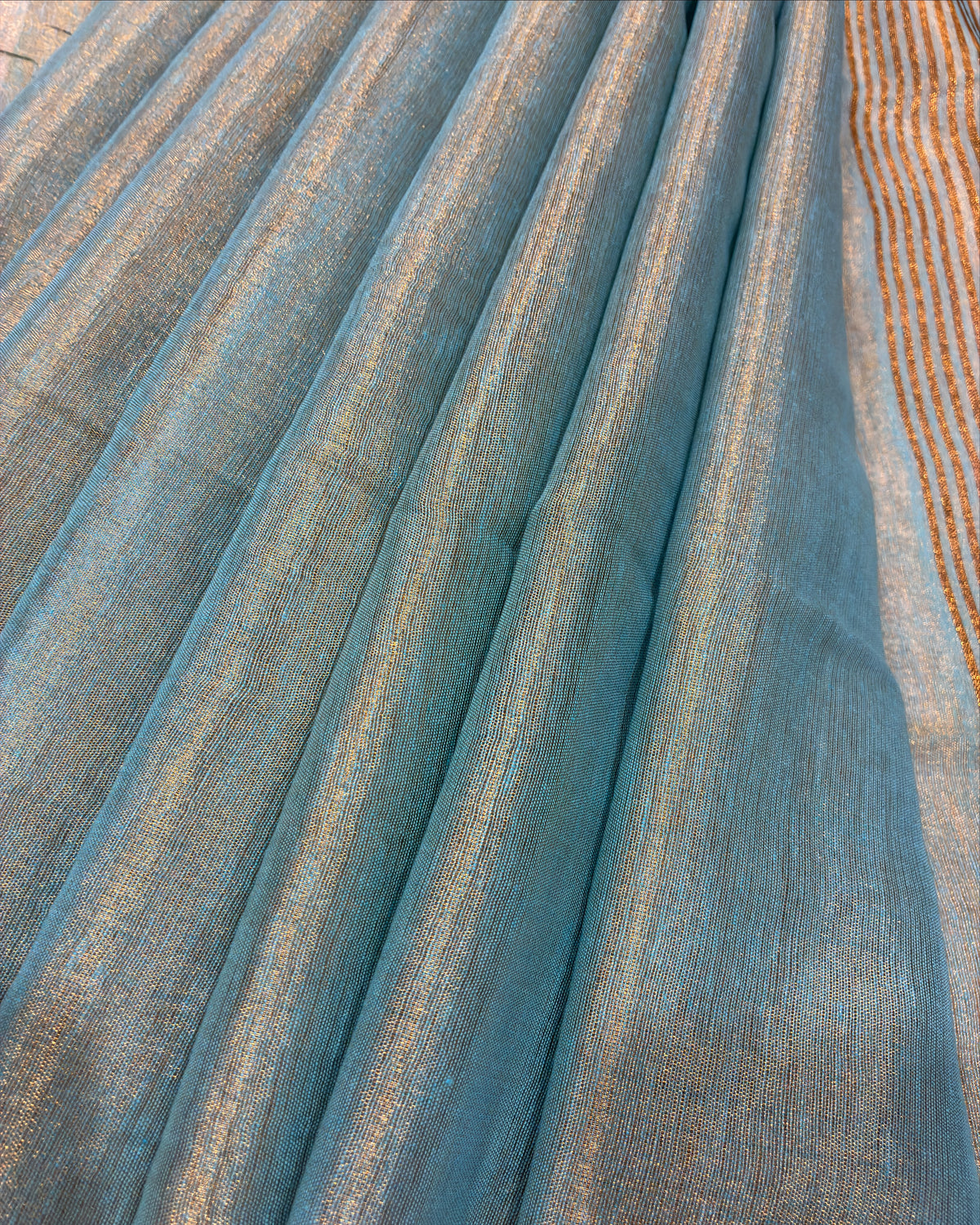 Powder Blue Linen Tissue Saree with Gold Pallu
