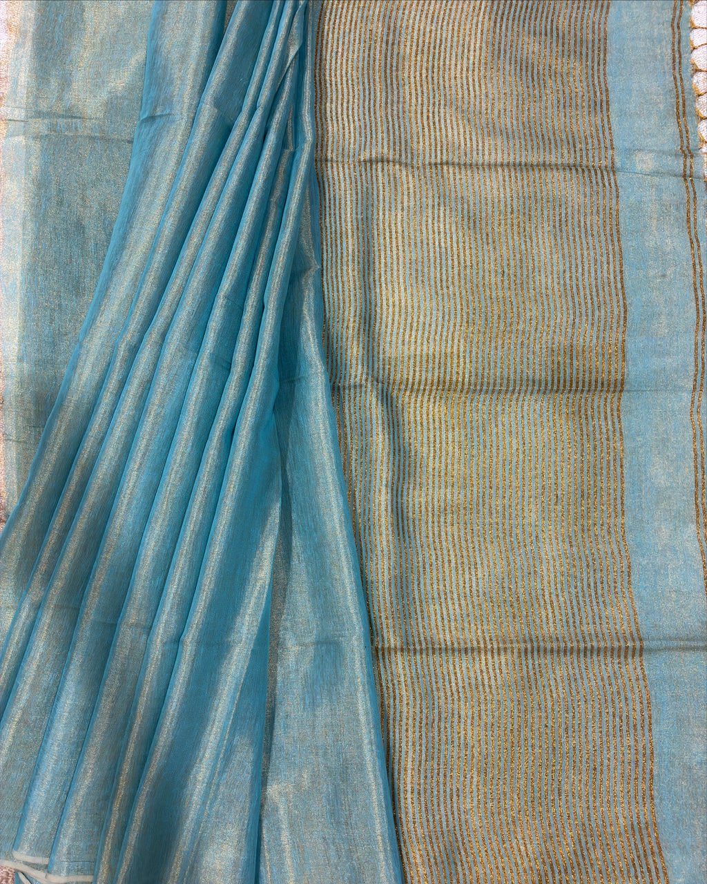 Powder Blue Linen Tissue Saree with Gold Pallu