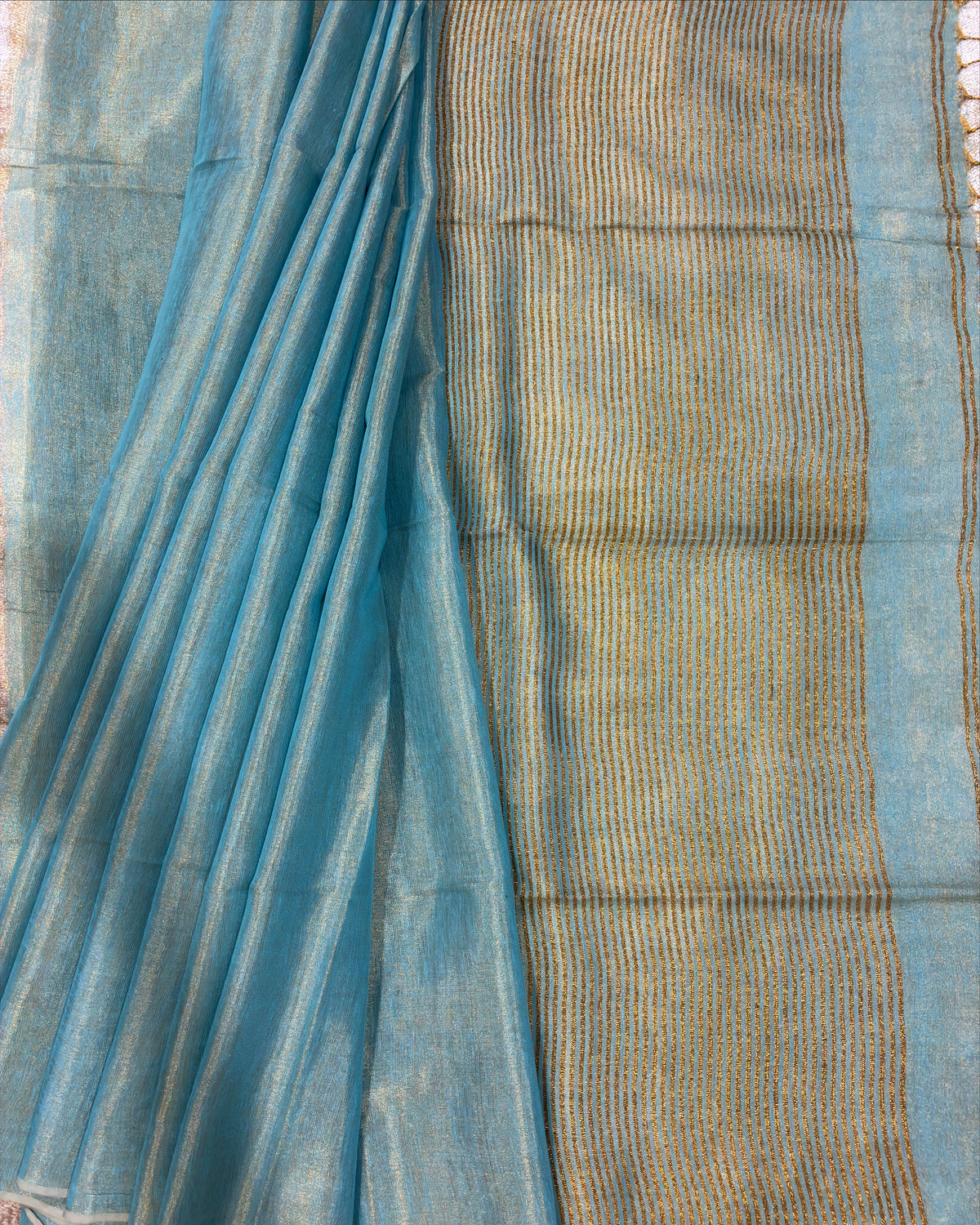 Powder Blue Linen Tissue Saree with Gold Pallu